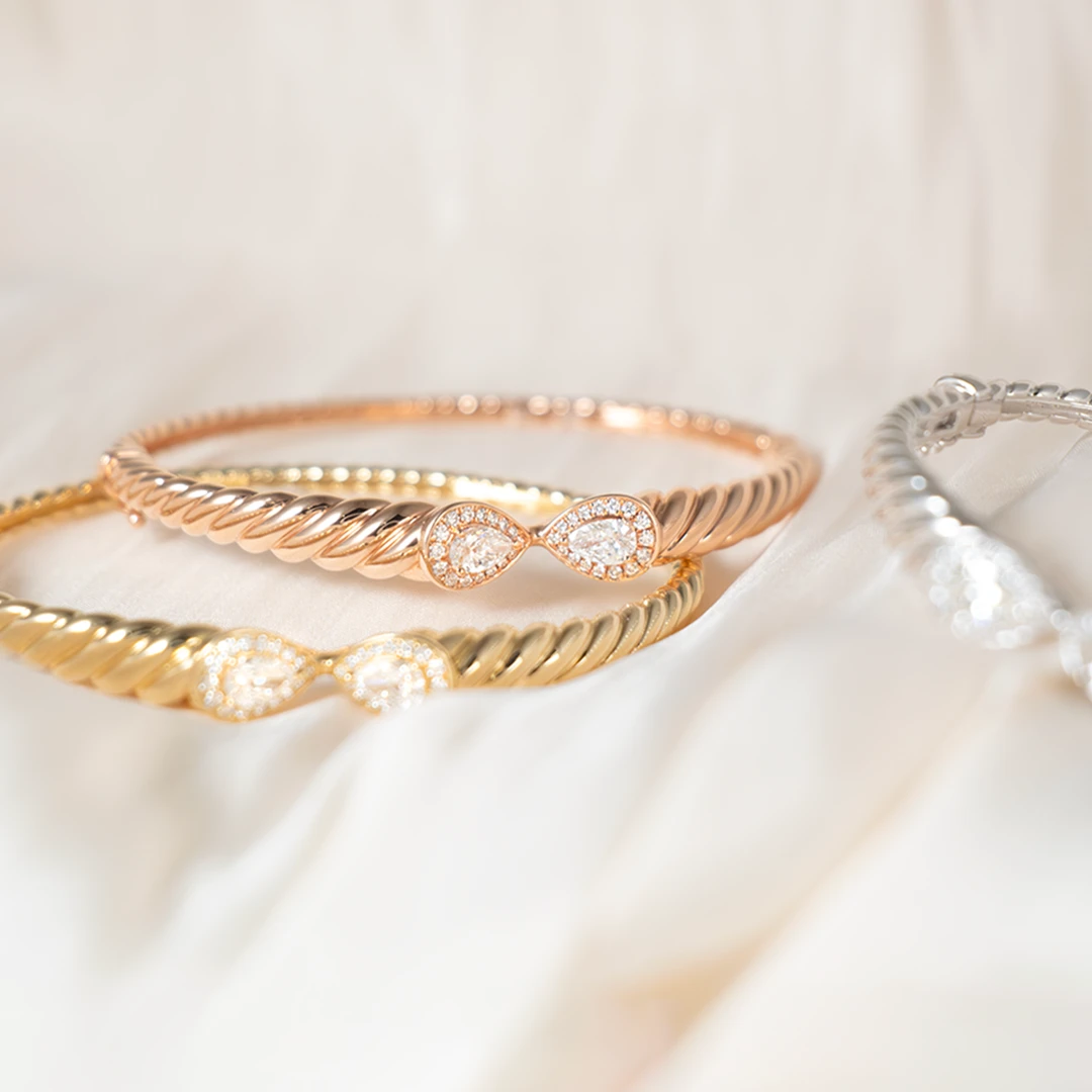 Rope pear shaped diamond bangle